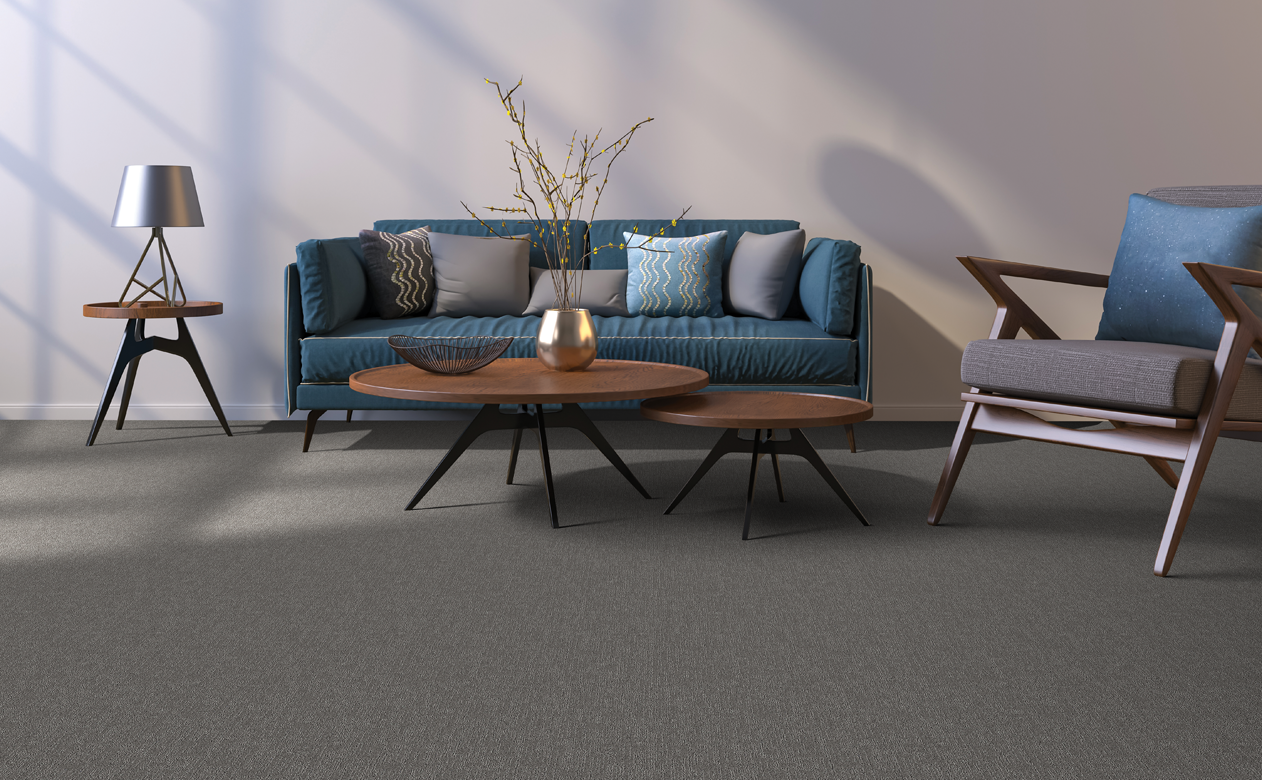 Grey berber carpet in living room with modern blue furniture 